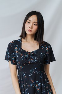 Liliana Printed Ruched Midi Dress in Black (XS)
