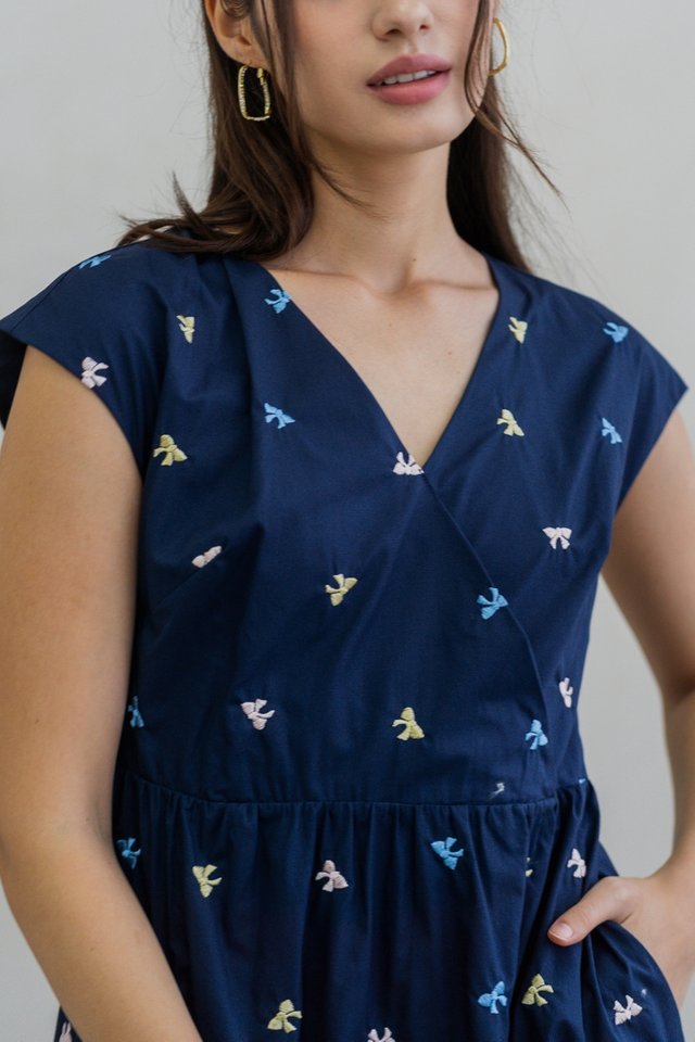 Bernice Ribbon Embroidery Overlap Midi Dress in Navy