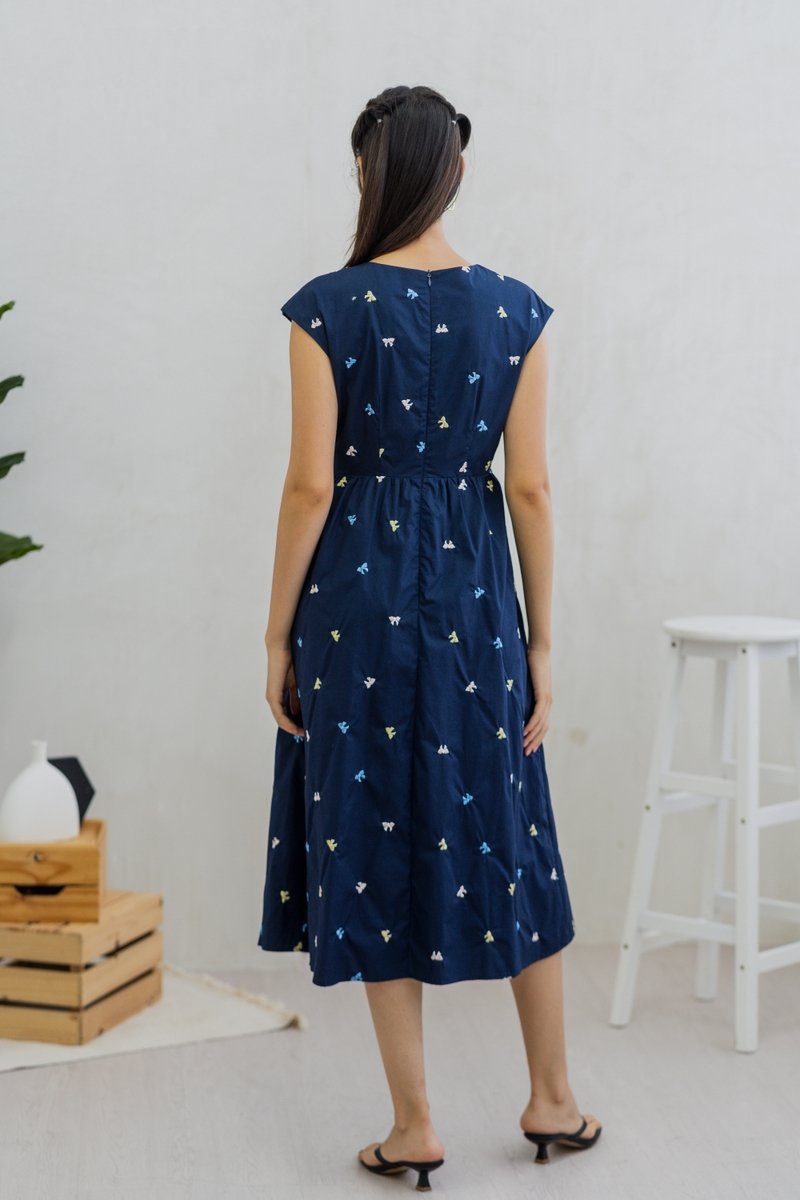 Bernice Ribbon Embroidery Overlap Midi Dress in Navy (XS)