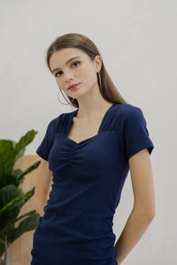 Tia Padded Ribbed Midi Dress In Navy