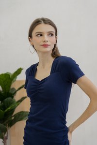 Tia Padded Ribbed Midi Dress In Navy
