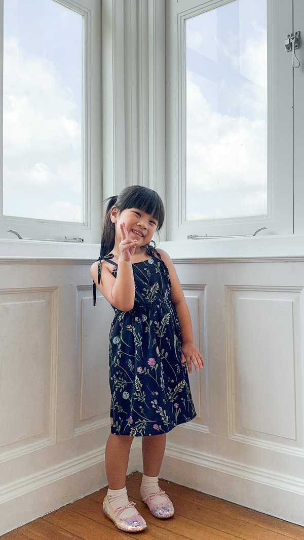 Lenora Self Tie Ribbon Kids Dress In Navy