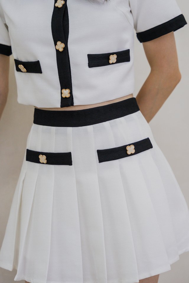 Emberly Clover Pleated Skort In White 