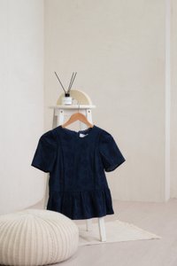 Cove Eyelet Peplum Top In Navy (XS)