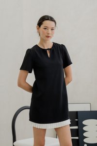 Britney Pleat Hem Bow Dress In Black (XS)