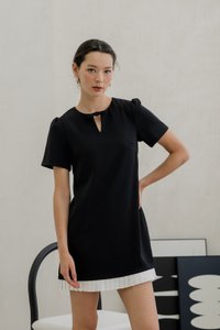 Britney Pleat Hem Bow Dress In Black (XS)