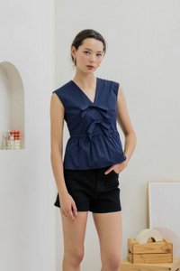 Posie V Neck Ribbon Peplum Top In Navy