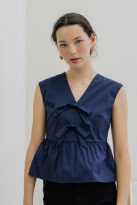 Posie V Neck Ribbon Peplum Top In Navy