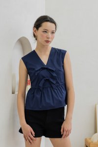 Posie V Neck Ribbon Peplum Top In Navy