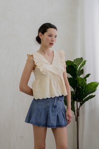 Avril Ribbon Embroidered Ruffle Top In Cream