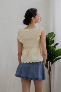 Avril Ribbon Embroidered Ruffle Top In Cream