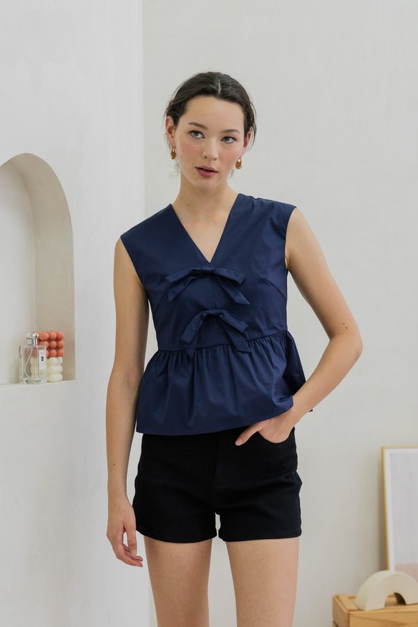 Posie V Neck Ribbon Peplum Top In Navy
