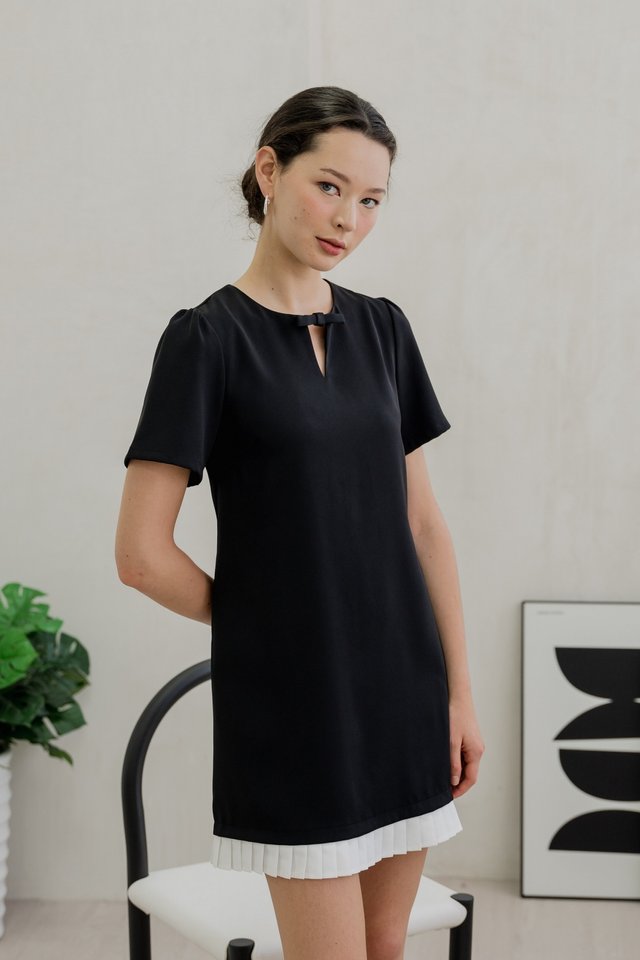 Britney Pleat Hem Bow Dress In Black