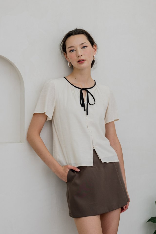 Topaz Textured Contrast Ribbon Top In Cream