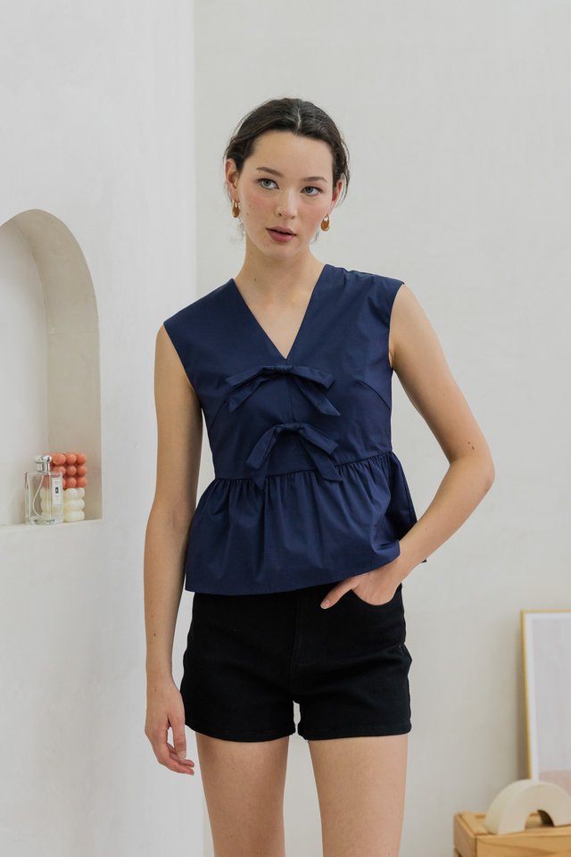 Posie V Neck Ribbon Peplum Top In Navy
