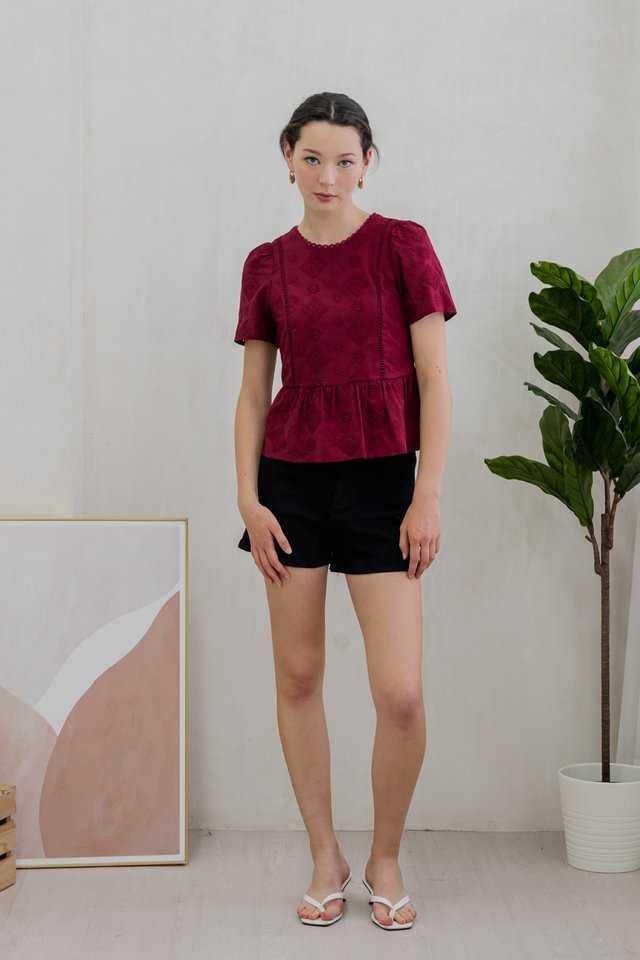 Cove Eyelet Peplum Top In Wine