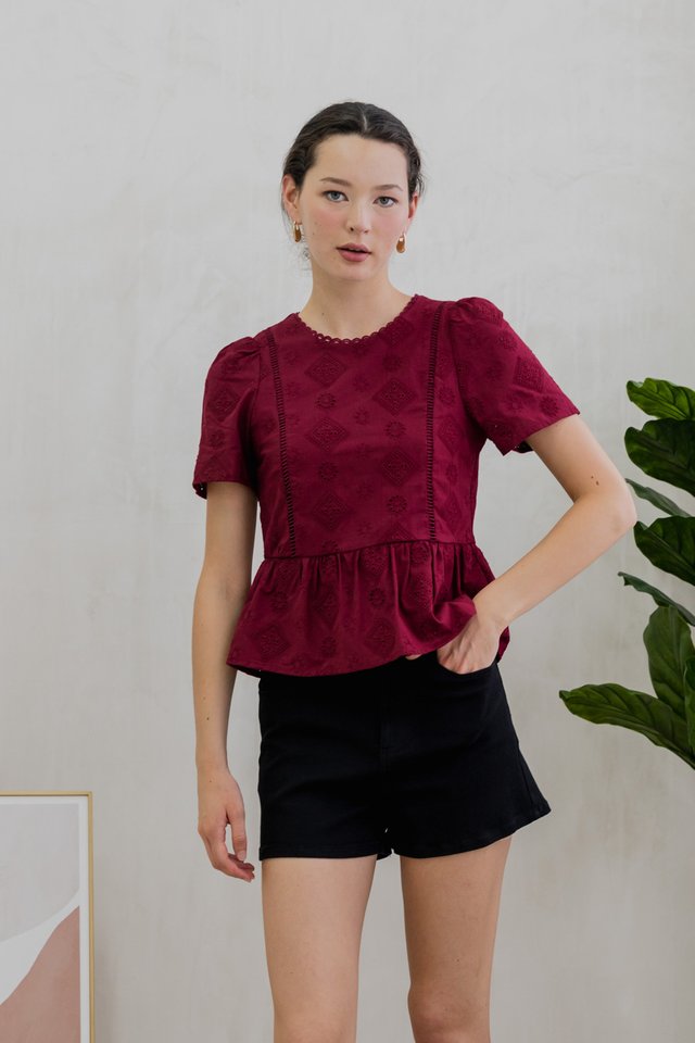 Cove Eyelet Peplum Top In Wine