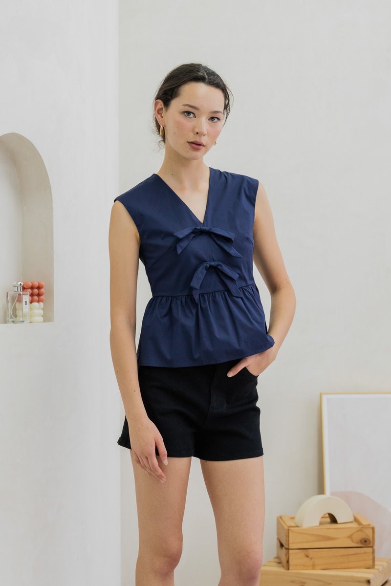 Posie V Neck Ribbon Peplum Top In Navy