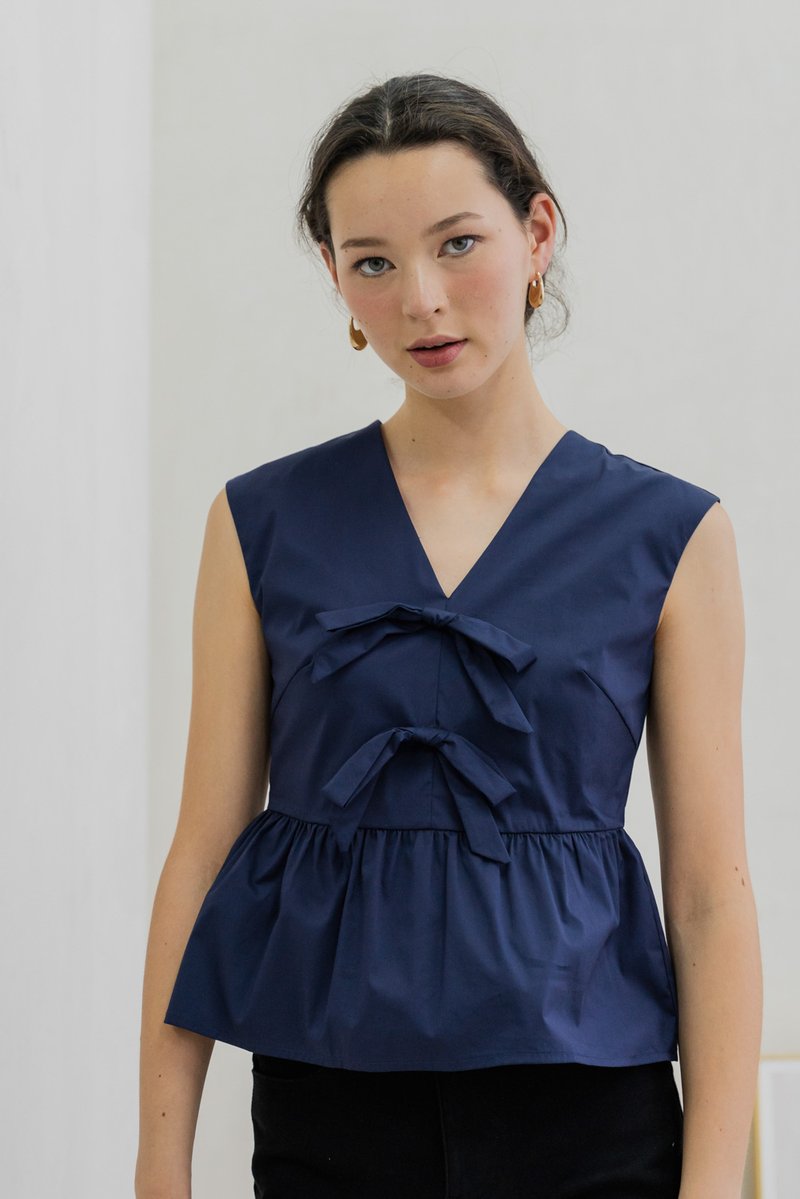 Posie V Neck Ribbon Peplum Top In Navy