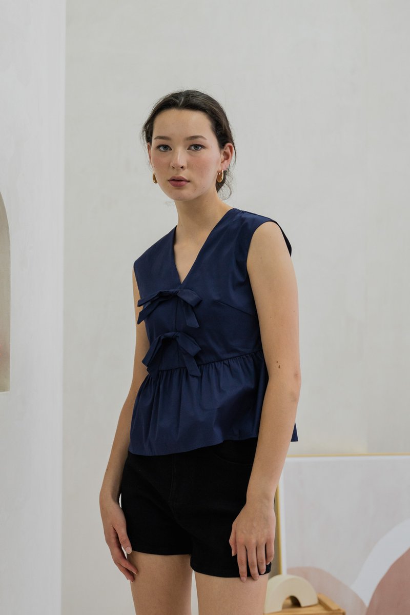Posie V Neck Ribbon Peplum Top In Navy