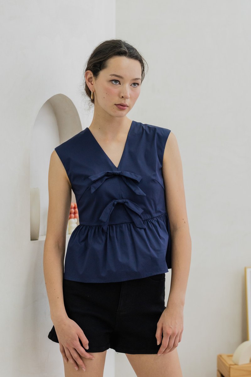 Posie V Neck Ribbon Peplum Top In Navy
