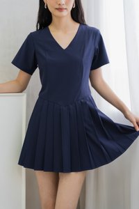 Roslyn Pleated Dress Romper In Navy (XS)