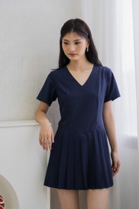 Roslyn Pleated Dress Romper In Navy (XS)