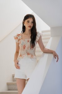 Ramona Ruffle Sleeve Smocked Top In Cream