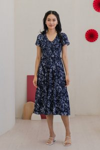Vela Floral Smocked V-neck Midi Dress in Navy (XS)
