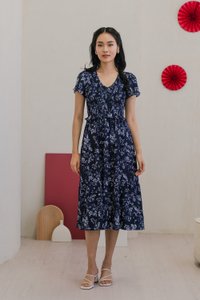 Vela Floral Smocked V-neck Midi Dress in Navy (XS)