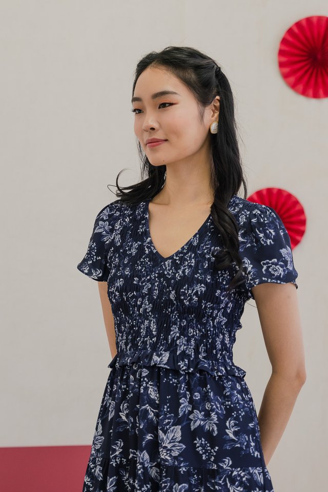 *BACKORDER* Vela Floral Smocked V-neck Midi Dress in Navy