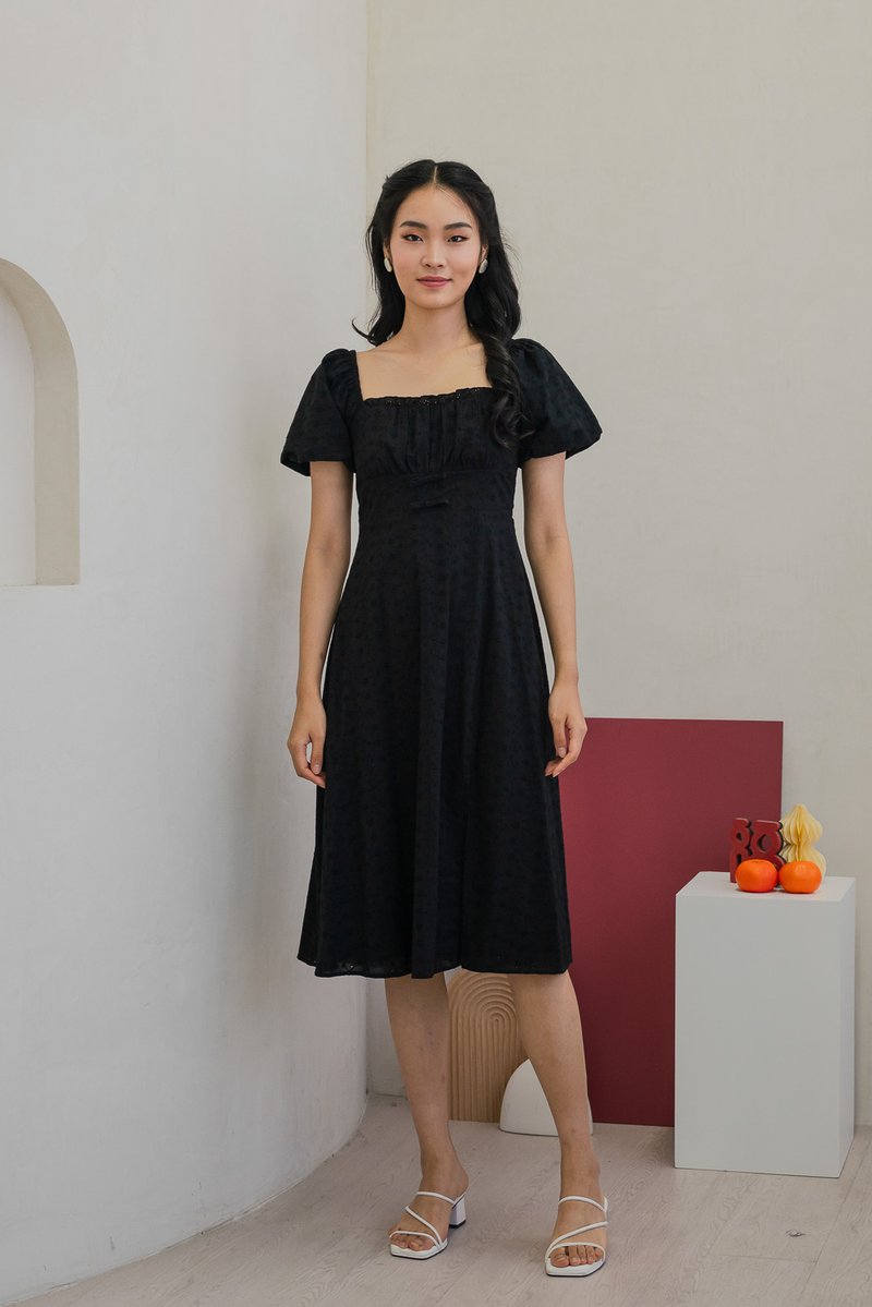 Brigette Eyelet Ruched Bow Midi Dress in Black