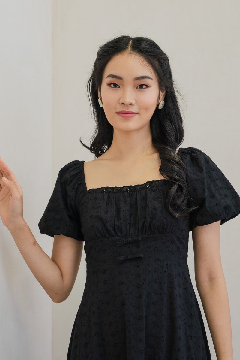 Brigette Eyelet Ruched Bow Midi Dress in Black