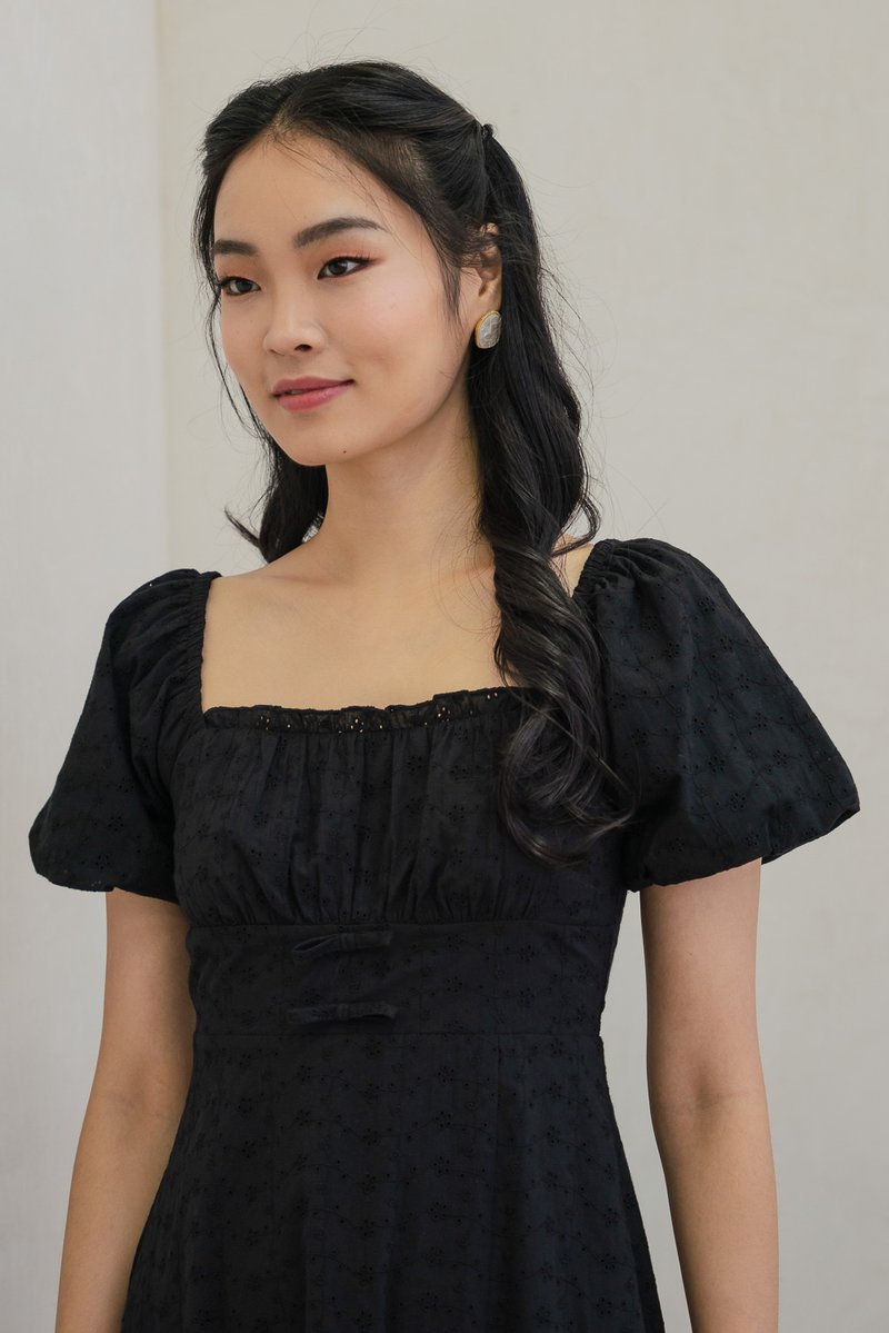 Brigette Eyelet Ruched Bow Midi Dress in Black