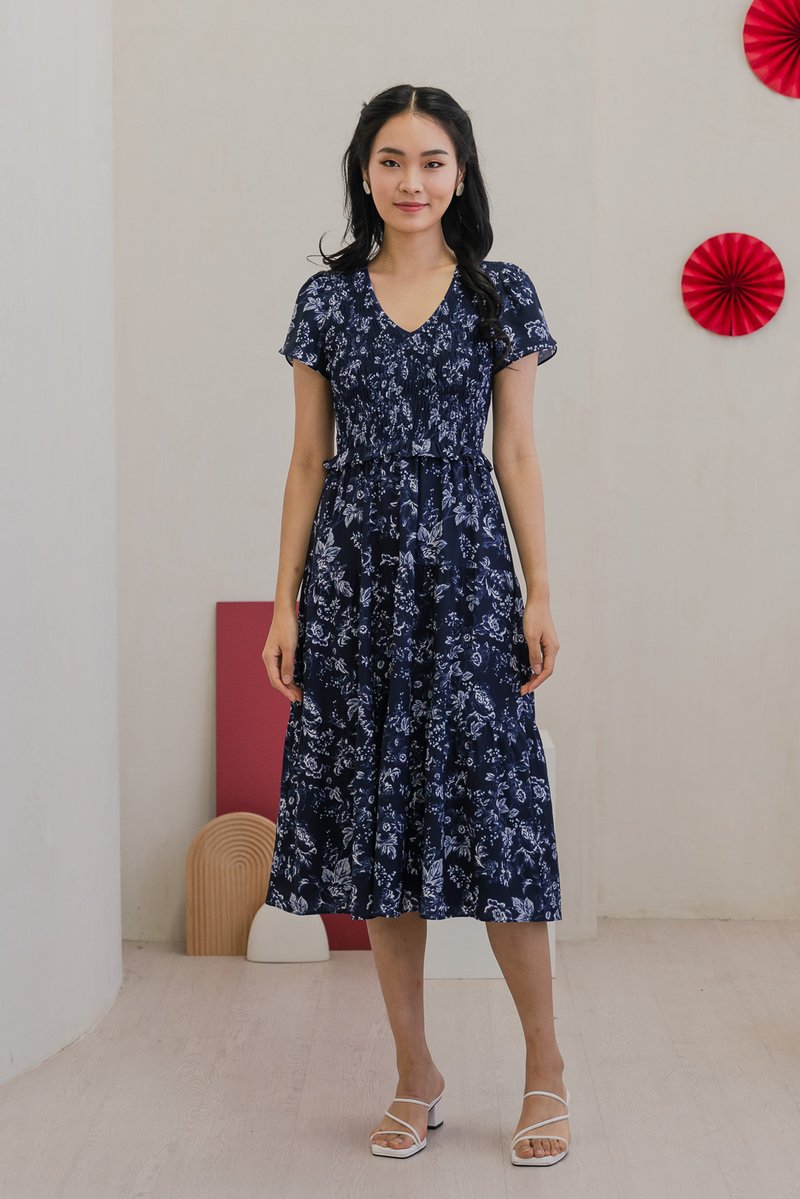 Vela Floral Smocked V-neck Midi Dress in Navy (XS)