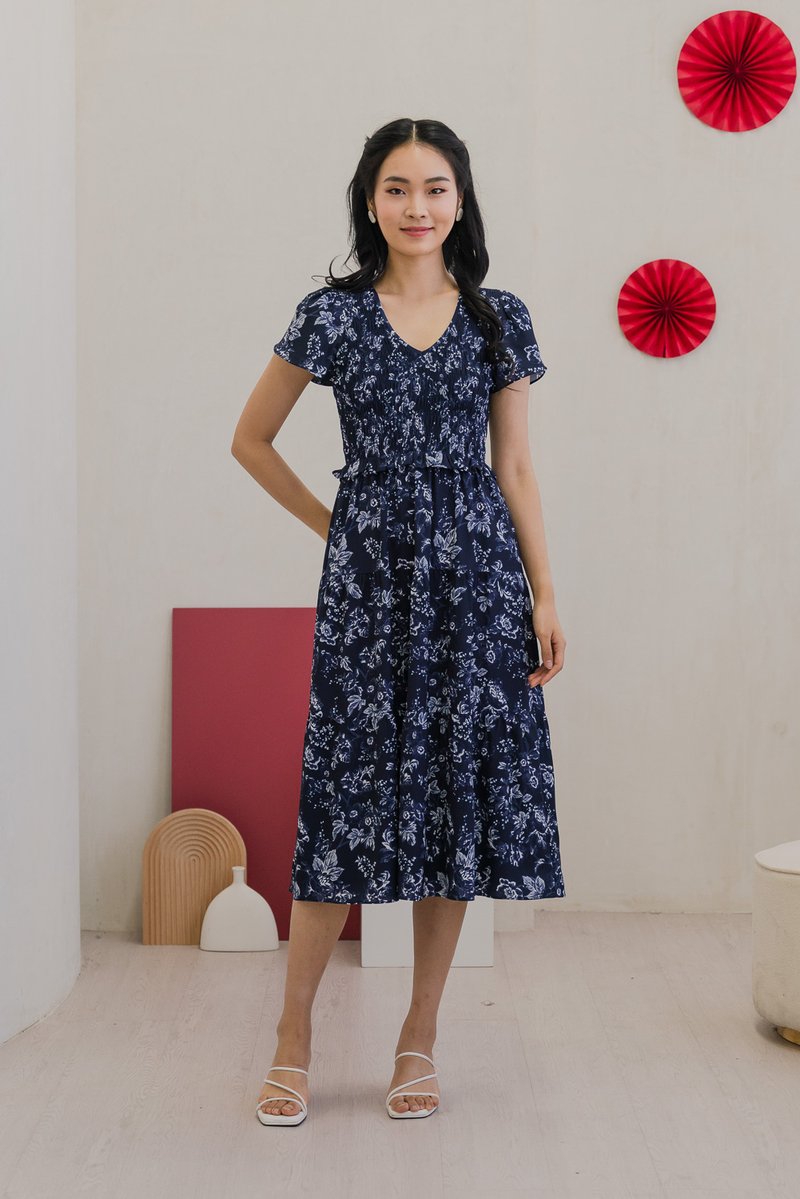 Vela Floral Smocked V-neck Midi Dress in Navy (XS)