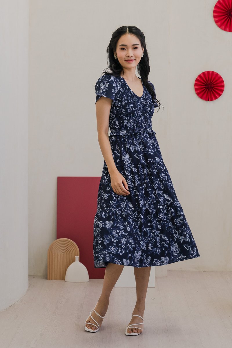 Vela Floral Smocked V-neck Midi Dress in Navy (XS)