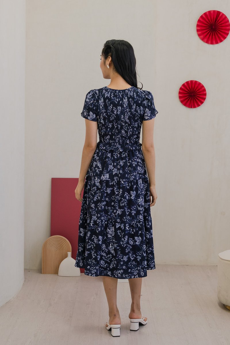 Vela Floral Smocked V-neck Midi Dress in Navy (XS)