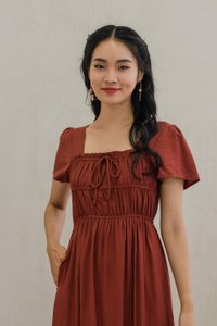 Mari Ruched Ribbon Midi Dress In Rust (XS)