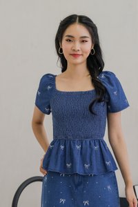 Ricca Smocked Ribbon Denim Top In Dark Wash