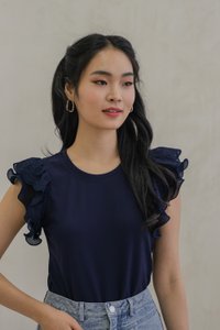 Charm Flutter Eyelet Sleeve Top In Navy (XS)