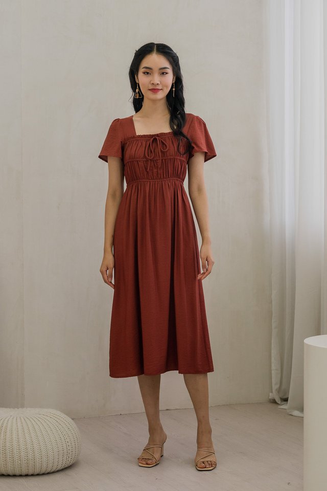 Mari Ruched Ribbon Midi Dress In Rust