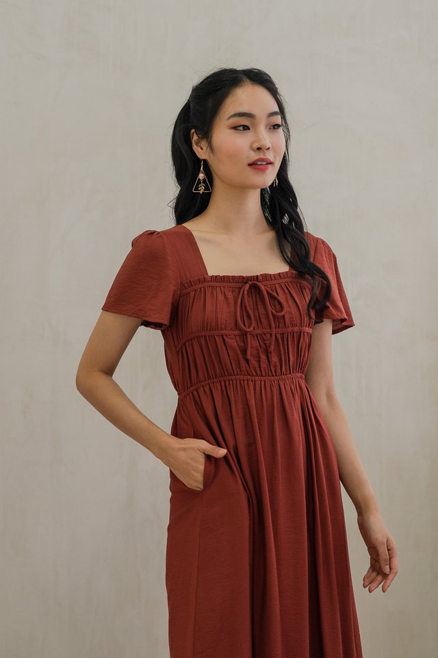 Mari Ruched Ribbon Midi Dress In Rust