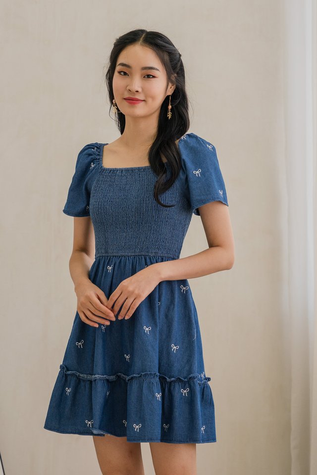 Radiant Smocked Ribbon Denim Dress In Dark Wash