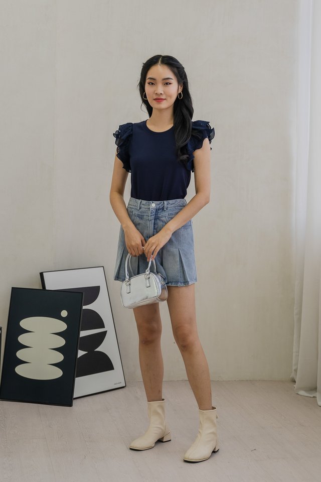 Charm Flutter Eyelet Sleeve Top In Navy