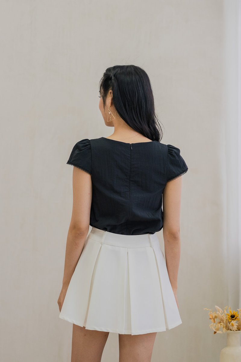 Celestine Pintuck Crochet Sleeve Top In Black
