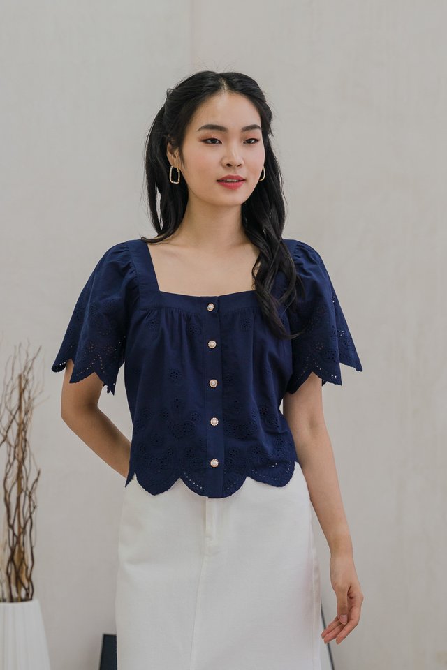Prim Pearl Button Eyelet Babydoll Top In Navy