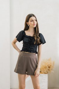 Syrus High Waisted Shorts In Brown