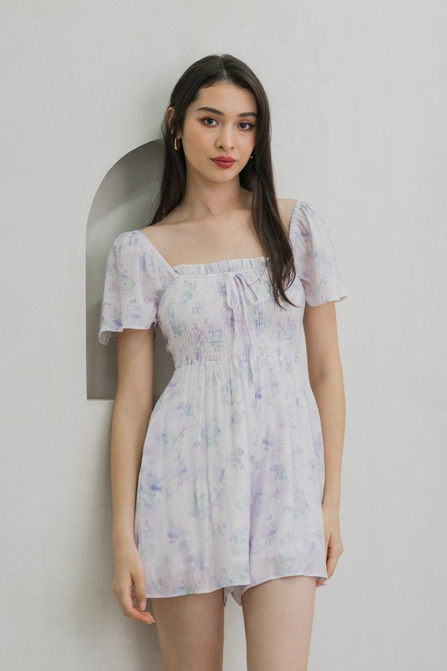 Afterglow Pastel Smocked Romper In Lavender