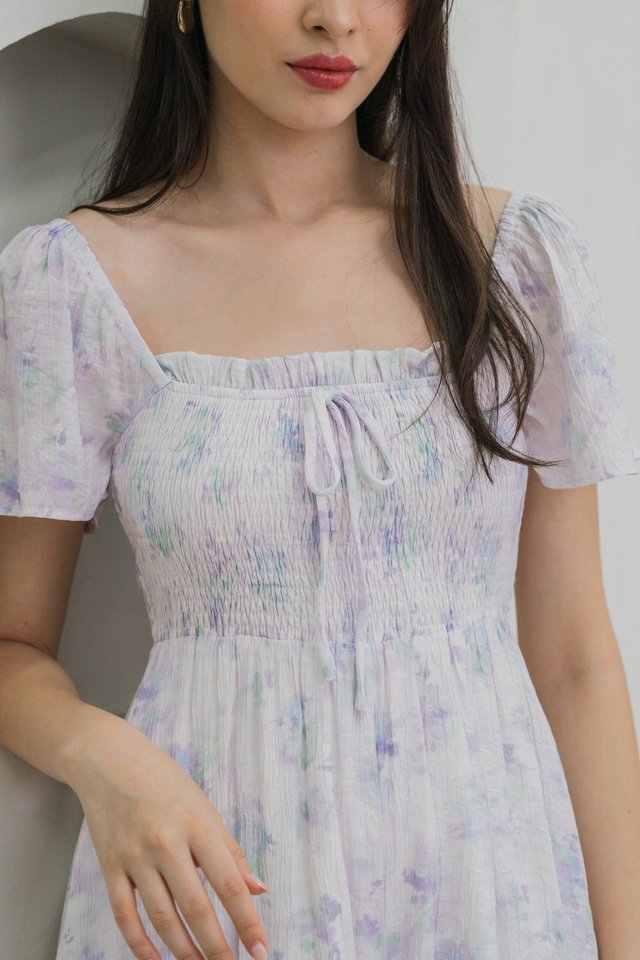 Afterglow Pastel Smocked Romper In Lavender